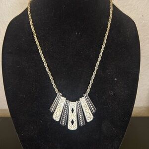 Elegant Silver Necklace with Intricate Detailing